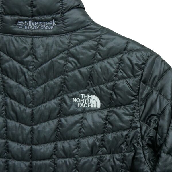 Doudoune femme manches longues noir The North Face Col Montant QWE3084