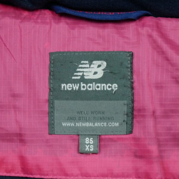 Doudoune femme manches longues rose New Balance Col Montant QWE1612