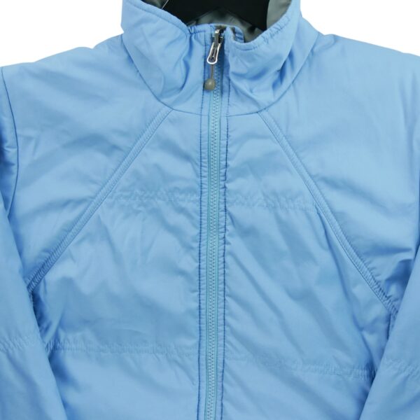 Blouson femme manches longues bleu clair The North Face Col Montant QWE0531